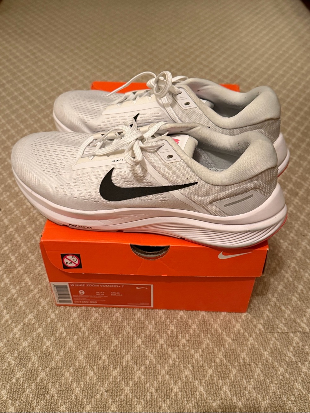Lightly worn Nike Light Gray and Black Women's Running Sneakers